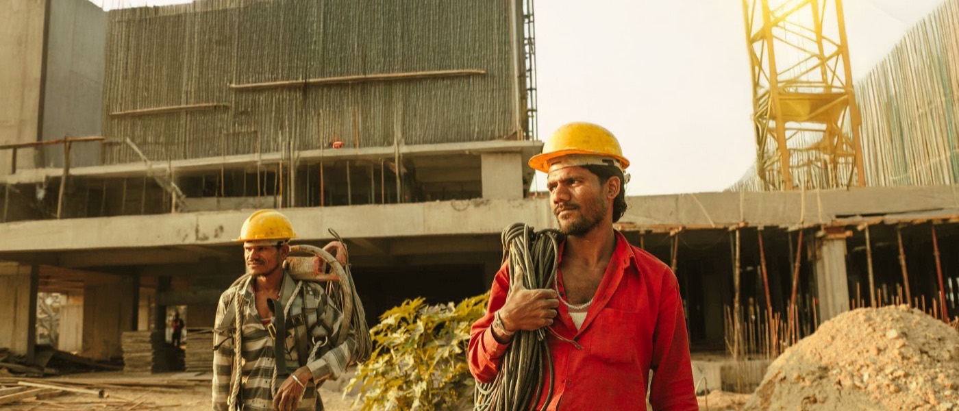 Construction workers on an active building site.
